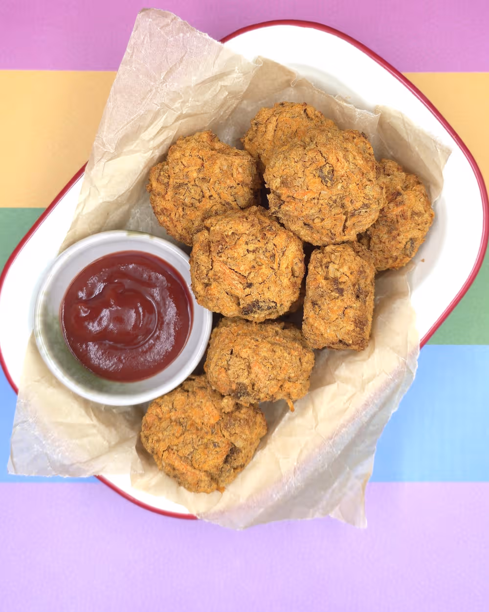 Veggie Nuggets on a plate with a dipping bowl of tomato sauce. Veggie Nuggets ready to eat.